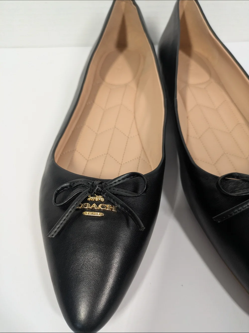 Coach Black Leather Pointed Ballet Flats with Bow and Gold Charm